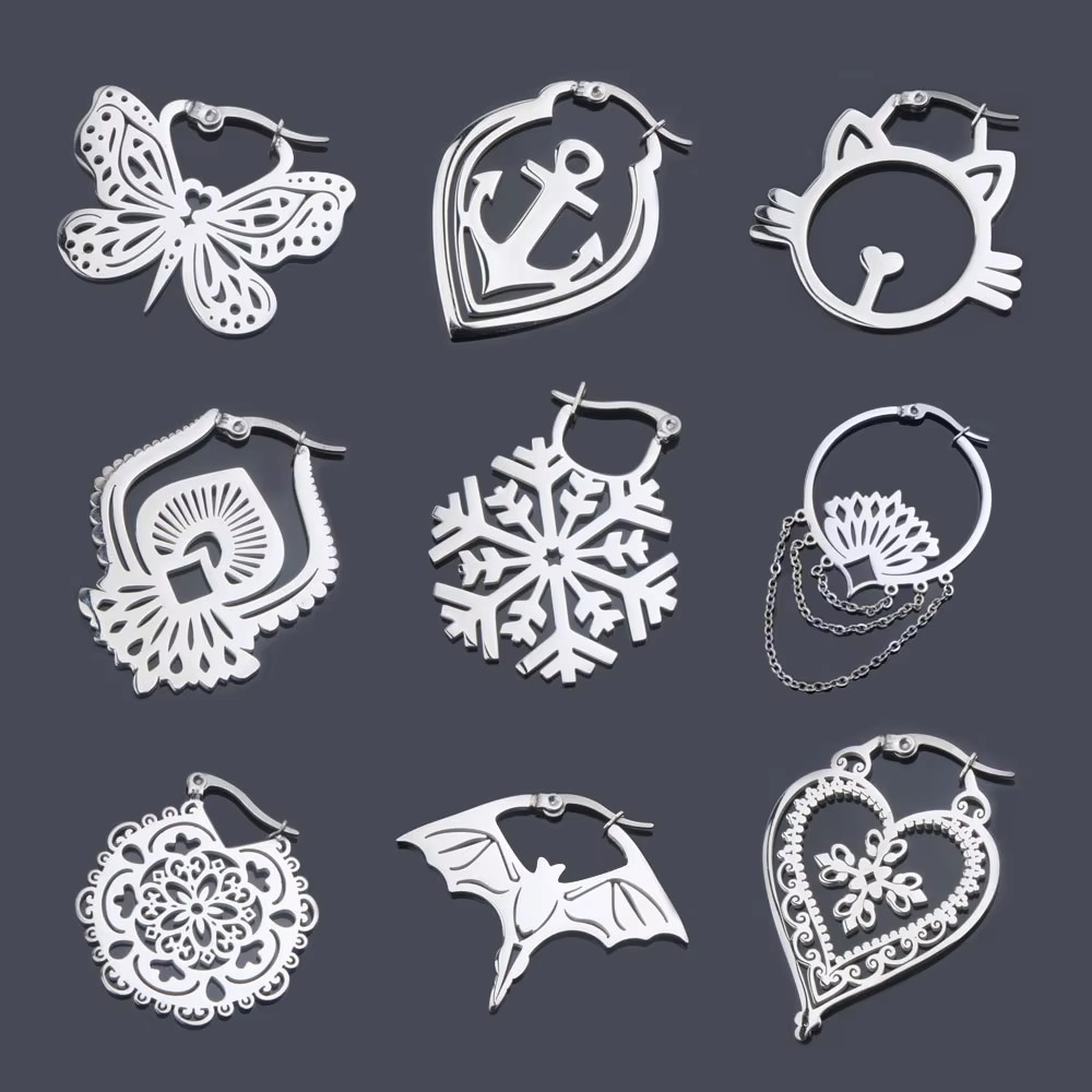 ボタン付きイヤークリップ,2個,7つのクリスタルが付いたパン - Body Piercing Quality Jewelry のレビューと価格